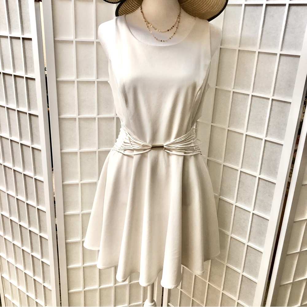 MARCIANO white cutout mini dress. Lined. Sexy and cute. Size 6 Good condition